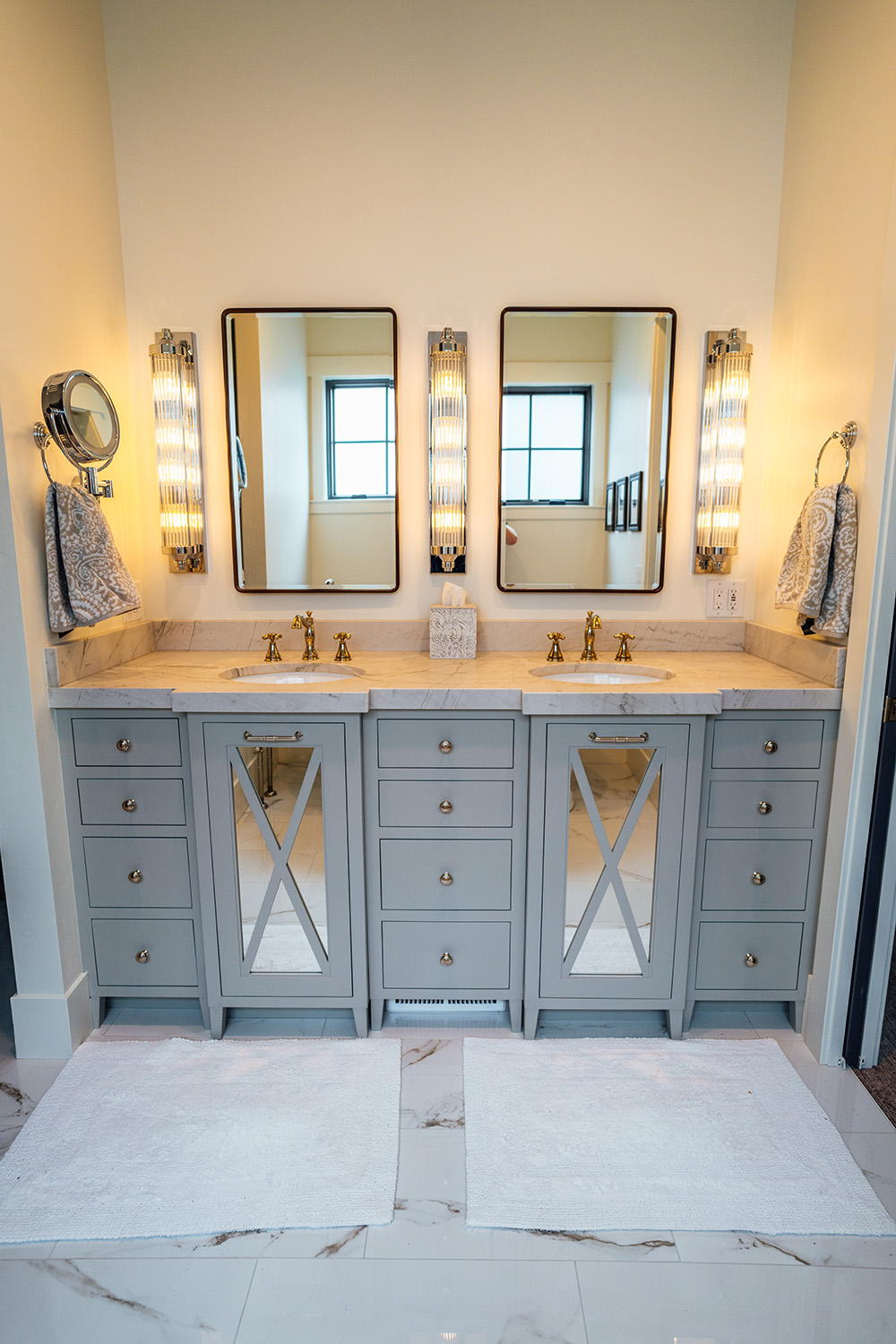 bathroom with gray cabinets